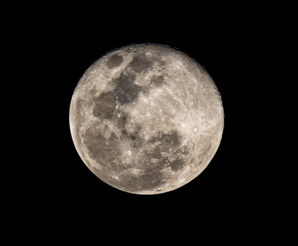 high resolution full moon photo from telescope isolated on black background