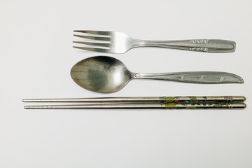 spoon and fork isolated in white
