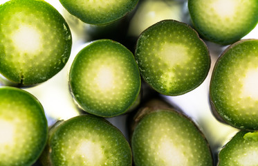 close up macro view of stacked fresh organic green asparagus