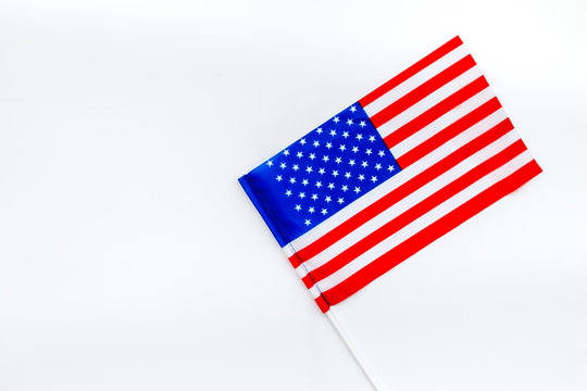 Independence Day of United States of America concept with flag on white background top view