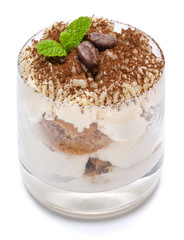 Classic tiramisu dessert in a glass isolated on a white background with clipping path