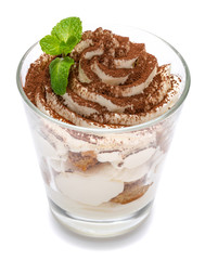 Classic tiramisu dessert in a glass isolated on a white background with clipping path