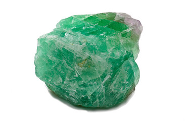 Green magenta and translucent fluorite mineral stone crystal isolated on white limbo background