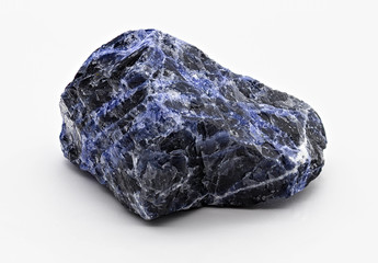 Black and blue veined sodalite mineral stone specimen isolated on white limbo background