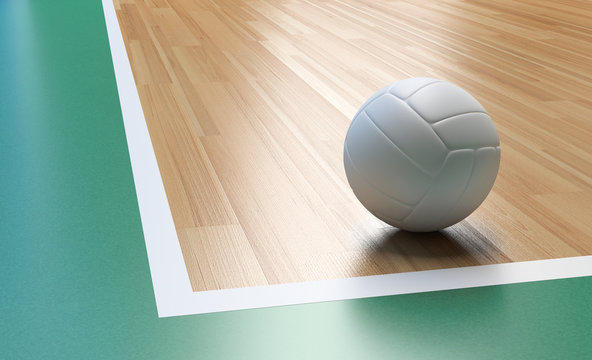 Volleyball With White Color On Wooden Court Floor Corner