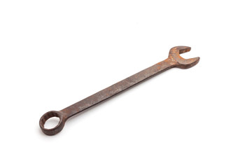 Old rusty wrench, isolated on white background