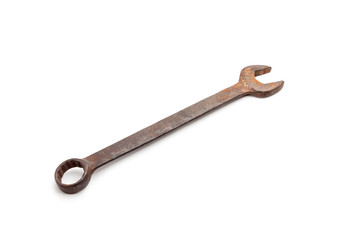 Old rusty wrench, isolated on white background