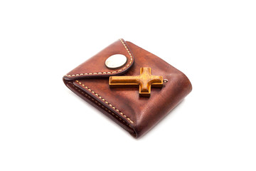 wallet and cross on white background 