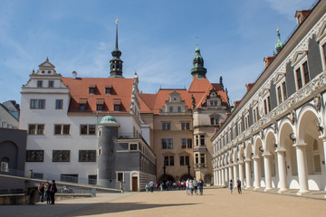 Obraz premium Dresden, Germany, restored Baroque architecture. Pompous and majestic city streets, tourists and transport on the holiday of Easter.