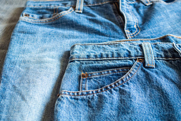 many denim blue jeans background