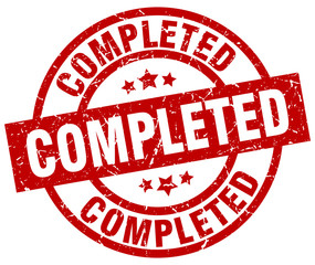 completed round red grunge stamp