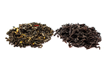 Leaves of black and green dry tea isolated on white background. View from above