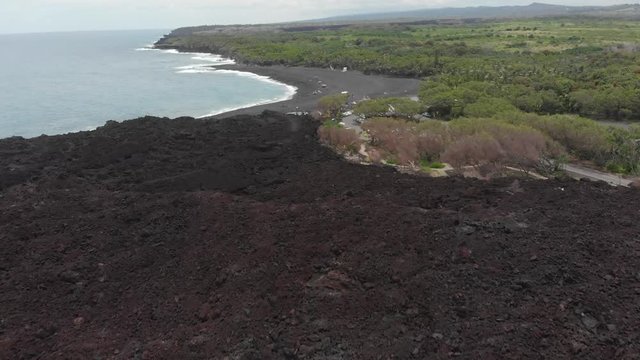 aerial of pohoiki aka Isaac Hale park. featuring new beach and lava field