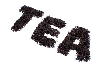 The inscription tea from the leaves of black tea isolated on white background