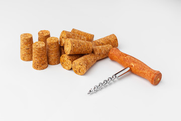 corkscrew and wine cork isolated on white background