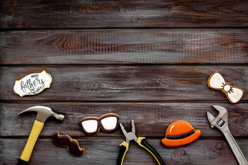 design for Father Day celebration party with cookies and instruments on wooden background top view mock up