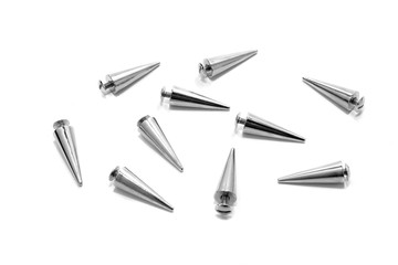 Silver metal spikes isolated on white background