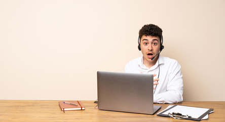 Telemarketer man surprised and shocked while looking right
