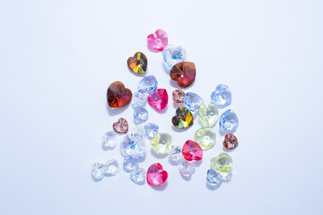 Glass heart close up on a gray background