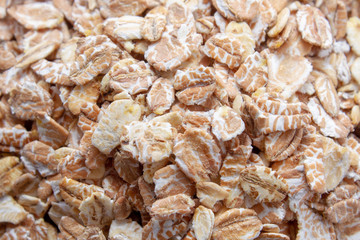 Oatmeal isolated on white background. Close-up.