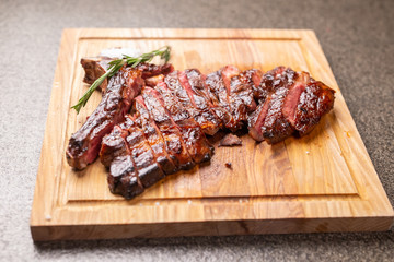 food, delicious, horse meat and craft concept - serving of grilled steak