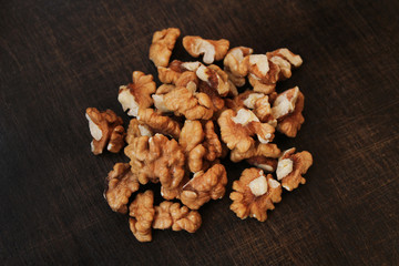 Walnuts on a wooden background. Close-up
