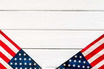 Fototapeta premium Memoral day of United States of America with flag on white wooden background top view mock up
