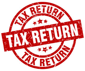 tax return round red grunge stamp