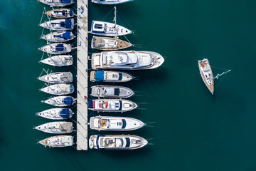 Aerial View of Yacht Club and Marina. White Boats and Yachts. Photo made by drone from above.