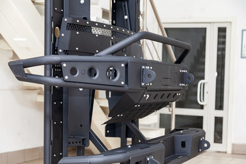 Stand for demonstration of car body elements reinforced for off-road and made of metal, such as...