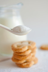 Milk and cookies on the white background