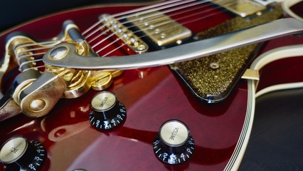 electric guitar  wine red  . closeup