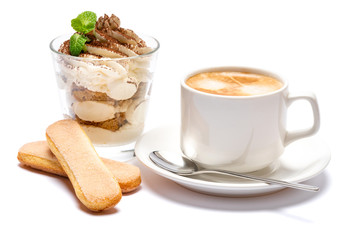 Classic tiramisu dessert in a glass and cup of coffee isolated on a white background with clipping path