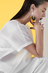 Calm fashionable model in white