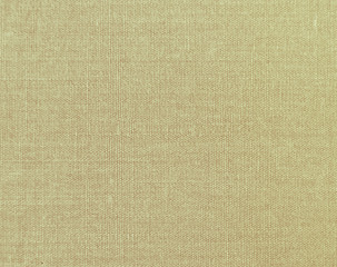 Textured  background of beige natural textile   