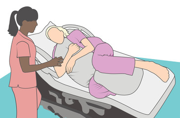 Pregnant woman in hospital using labor support pillow