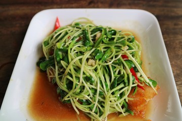 Sunflower sprouts fried with oyster sauce and chili. Thai food style. Food concept.