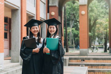 student wear university graduation uniform smile