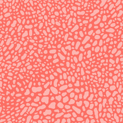 Animal skin texture seamless pattern in coral. Vector exotic ornate background