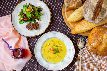 lunch on the table grilled meat and soup