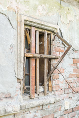 The windows of abandoned dilapidated house