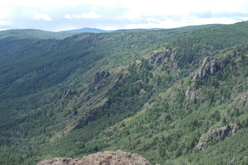 Fototapeta na wymiar mountain view from the top of the mountains