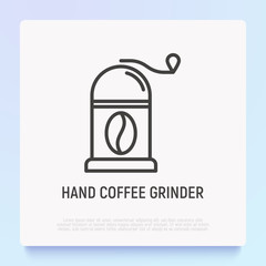 Hand coffee grinder with coffee bean thin line icon. Modern vector illustration for cafe logo.