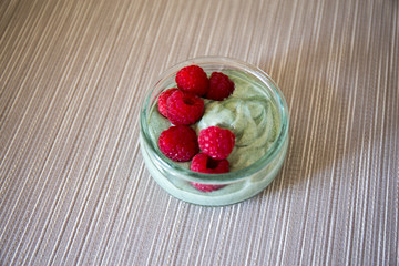 Matcha green tea yogurt and raspberries