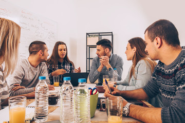 Leaders making a strategy while rising their hands