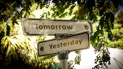 Street Sign the Direction Way to Tomorrow versus Yesterday