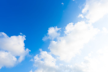 Nature Bright blue Sky with white clouds on blackground. Beautiful sky and clouds in the afternoon.