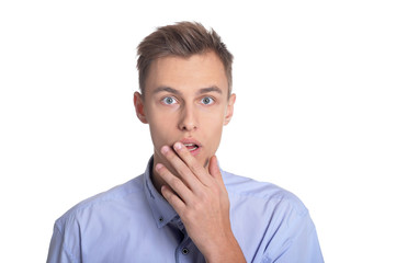 Portrait of young man posing on white background
