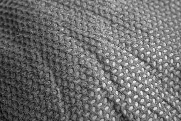 Texture black painted fabric background.