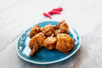 fried chicken wings on table